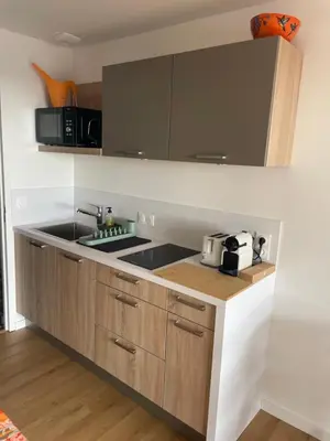 Cuisine ou kitchenette dans l'établissement Appartement bord de mer