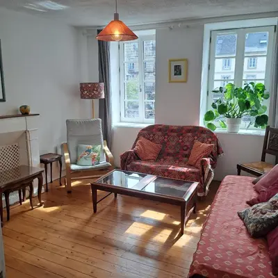 Coin salon dans l'établissement Bel appartement au centre
