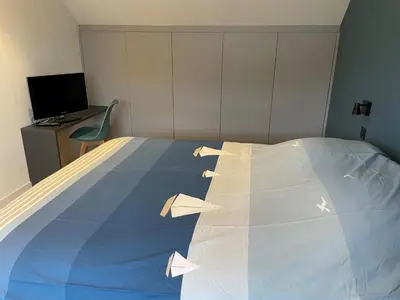 Un ou plusieurs lits dans un hébergement de l'établissement Maison les pieds dans l'eau