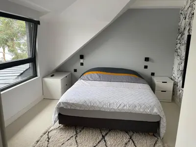 Un ou plusieurs lits dans un hébergement de l'établissement Maison les pieds dans l'eau
