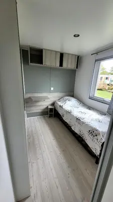 Un ou plusieurs lits dans un hébergement de l'établissement MH GRAND CONFORT 40 m2 3CH 2 SDB 2 TOILETTES