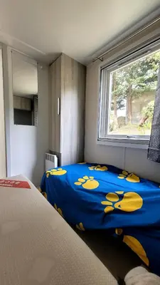 Un ou plusieurs lits dans un hébergement de l'établissement MH GRAND CONFORT 40 m2 3CH 2 SDB 2 TOILETTES