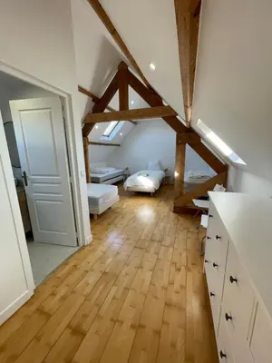 Un ou plusieurs lits dans un hébergement de l'établissement Grande maison 20 min plage, 14 personnes, 5 SDB, literie grand confort