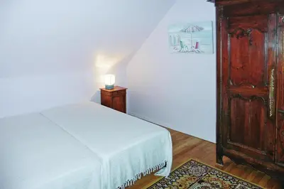 Un ou plusieurs lits dans un hébergement de l'établissement Holiday Home in Brittany near Sandy Beaches
