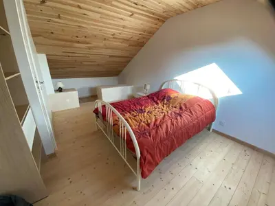 Un ou plusieurs lits dans un hébergement de l'établissement Maison Yvonne