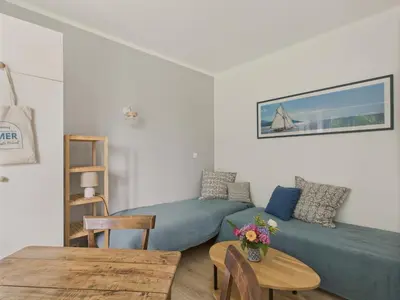 Coin salon dans l'établissement Dépendance 2 adultes 2 enfants - avec jardin