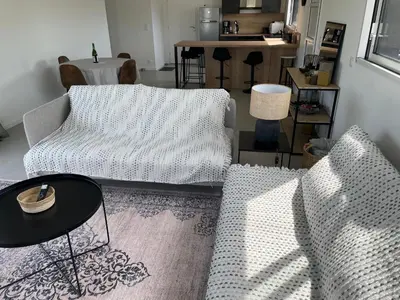 Coin salon dans l'établissement Jolie maison neuve proche du Guilvinec et des plages