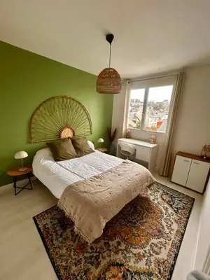 Un ou plusieurs lits dans un hébergement de l'établissement Spacieux appartement 2 chambres Quimper