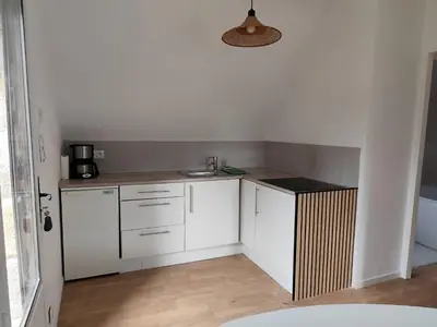 Cuisine ou kitchenette dans l'établissement Proche parc 3 curés