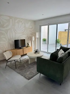 Télévision ou salle de divertissement dans l'établissement Duplex en plein coeur de Landerneau