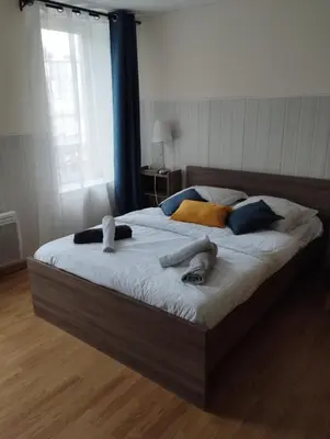 Un ou plusieurs lits dans un hébergement de l'établissement BREST quartier St Michel avec 1 chambre