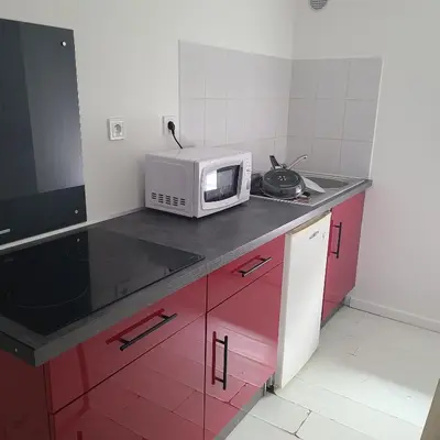 Cuisine ou kitchenette dans l'établissement BREST quartier St Michel avec 1 chambre