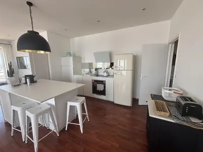 Cuisine ou kitchenette dans l'établissement Le Balcon de Tresmeur