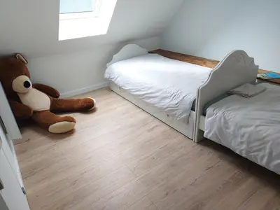 Un ou plusieurs lits dans un hébergement de l'établissement Petite maison à la campagne