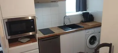Cuisine ou kitchenette dans l'établissement Charmante Maison Bretonne avec Piscine Chauffée