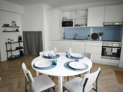 Cuisine ou kitchenette dans l'établissement L'Azur - Appartement spacieux - Arrivée Autonome