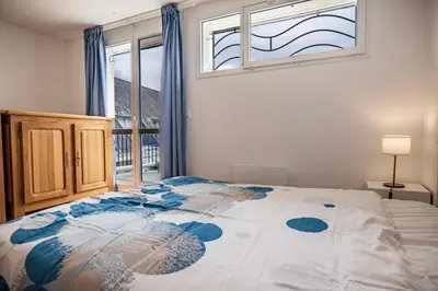 Un ou plusieurs lits dans un hébergement de l'établissement Les balcons de la Thalasso