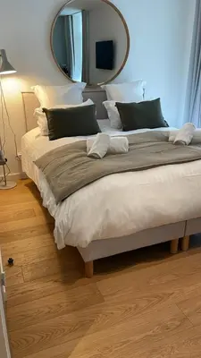 Un ou plusieurs lits dans un hébergement de l'établissement Triagoz bord de mer Studio Trebeurden