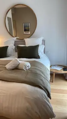 Un ou plusieurs lits dans un hébergement de l'établissement Triagoz bord de mer Studio Trebeurden
