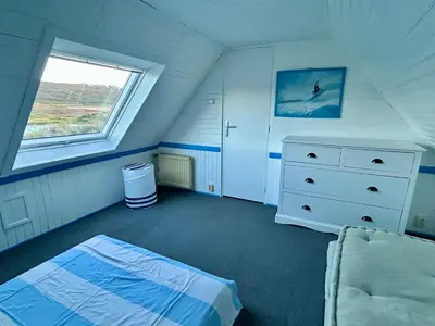 Un ou plusieurs lits dans un hébergement de l'établissement En bord de plage à la Pointe du Raz