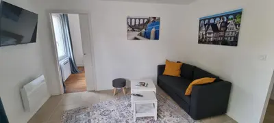 Coin salon dans l'établissement Appartement lumineux -terrasse au cœur de Morlaix