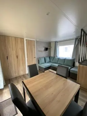 Coin salon dans l'établissement Mobil home Bora Bora