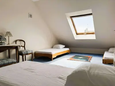 Un ou plusieurs lits dans un hébergement de l'établissement Bénodet: Appartement Duplex à 50m de la plage, Vue Mer, Parking - FR-1-481-182
