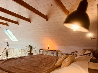 Un ou plusieurs lits dans un hébergement de l'établissement La Casa de Natina Cocoon & Balnéo