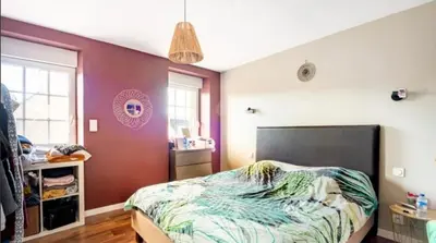 Un ou plusieurs lits dans un hébergement de l'établissement Maison de ville