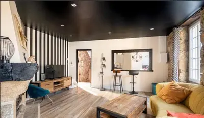 Coin salon dans l'établissement Maison de ville