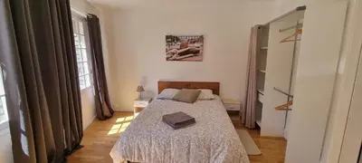 Un ou plusieurs lits dans un hébergement de l'établissement Logement spacieux et lumineux à Morlaix