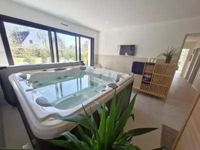 Télévision ou salle de divertissement dans l'établissement Villa Locmaria