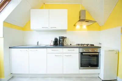 Cuisine ou kitchenette dans l'établissement Les Hauts de Morgat I Terrasse & plage à 100m