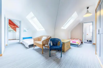 Coin salon dans l'établissement Family vacation home 100 m from beach - Ty For Tous