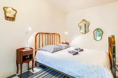 Un ou plusieurs lits dans un hébergement de l'établissement Family vacation home 100 m from beach - Ty For Tous
