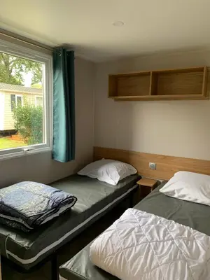 Un ou plusieurs lits dans un hébergement de l'établissement Mobil home 4 personnes
