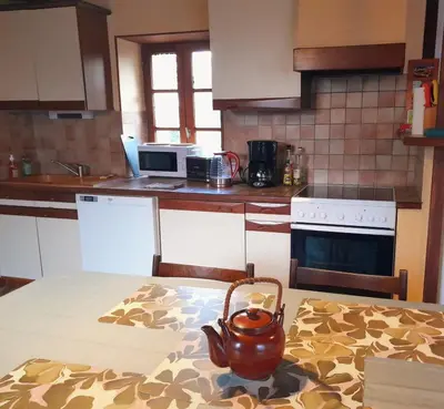 Cuisine ou kitchenette dans l'établissement Maison sur la Presqu'île de Plougastel