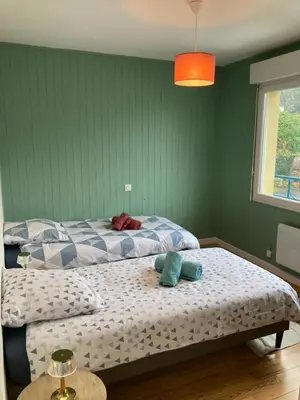Un ou plusieurs lits dans un hébergement de l'établissement An Ty Bihan Pont-Aven