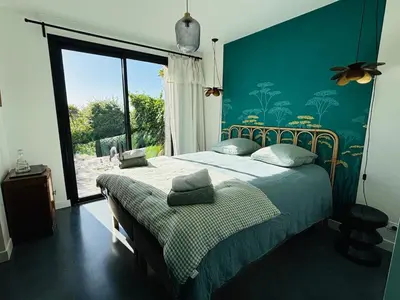 Un ou plusieurs lits dans un hébergement de l'établissement 6-person villa with pool