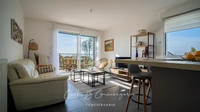 Coin salon dans l'établissement ESCALE MARINE - Appartement 2 pers vue mer proche centre-ville et Corniche