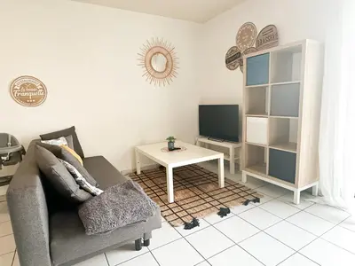 Télévision ou salle de divertissement dans l'établissement Le Balcon Brestois