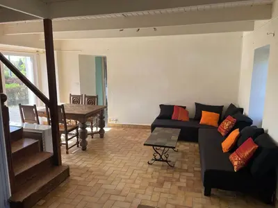 Coin salon dans l'établissement Charmante maison de campagne
