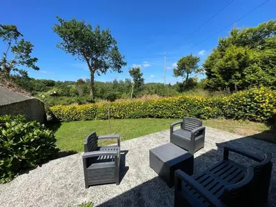 Jardin de l'établissement Charmante maison de campagne