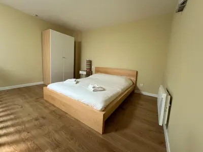 Un ou plusieurs lits dans un hébergement de l'établissement Appartement T2 N6 calme et cosy sur un golf