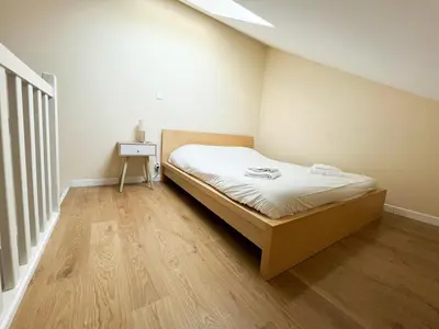 Un ou plusieurs lits dans un hébergement de l'établissement Appartement T2 N5 calme et cosy sur un golf