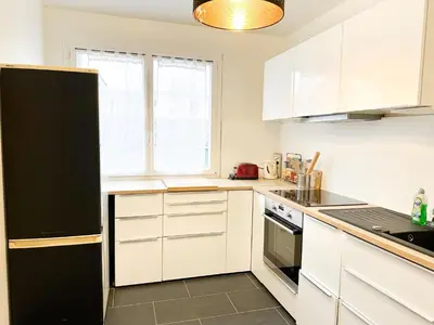 Cuisine ou kitchenette dans l'établissement Appartement lumineux avec balcon Parking privé