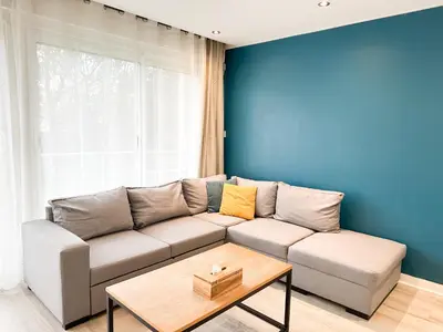 Coin salon dans l'établissement Appartement lumineux avec balcon Parking privé
