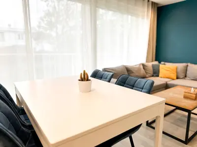 Coin salon dans l'établissement Appartement lumineux avec balcon Parking privé