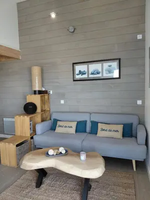Coin salon dans l'établissement Les Terrasses de Kerfissien vue mer 2-6 pers Holim' Prest
