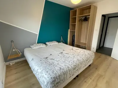 Un ou plusieurs lits dans un hébergement de l'établissement Appartement cosy et calme au cœur de Landerneau